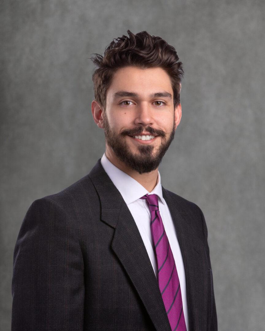 Alec Bahmed Headshot with Gray Background